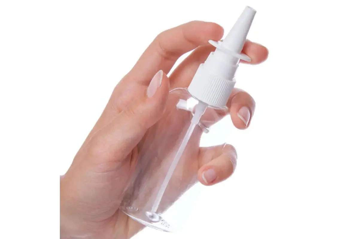 2 oz. Clear Plastic Oval Bottle with White Nasal Spray Top