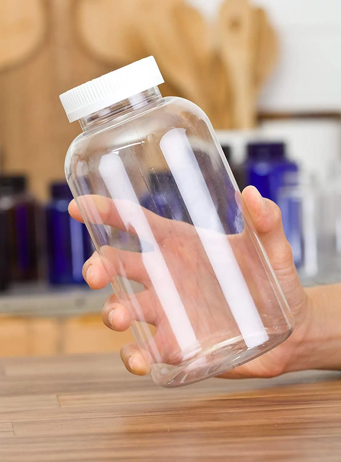 32 oz Clear Plastic Wide Mouth Packer Bottle with WhiteLid